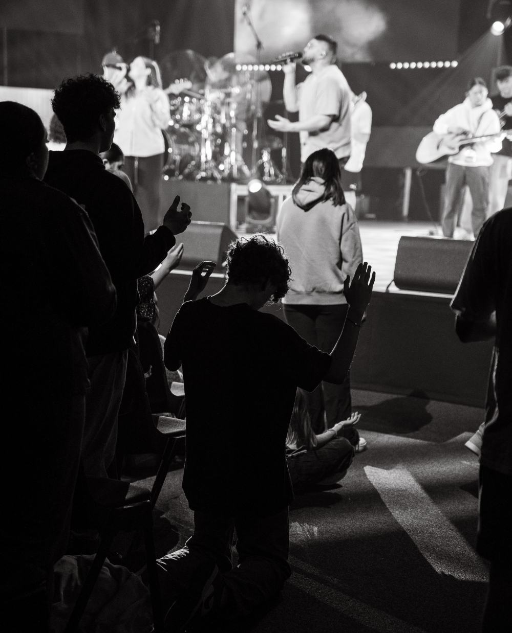 Young people worshipping