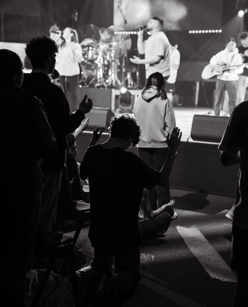 Young people worshipping